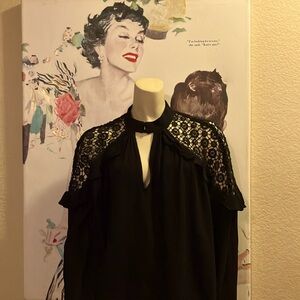 Beautiful black Free People blouse.